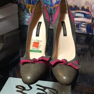 Pink trimmed gray heels